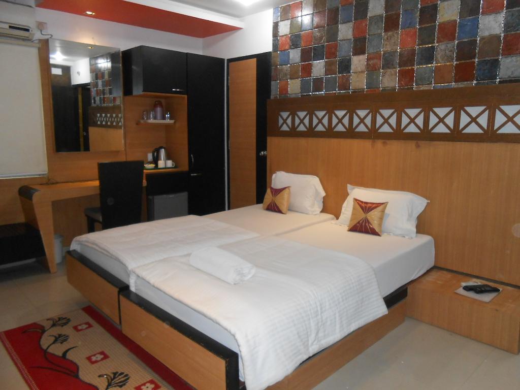 Hiland Inn Kalkutta Zimmer foto